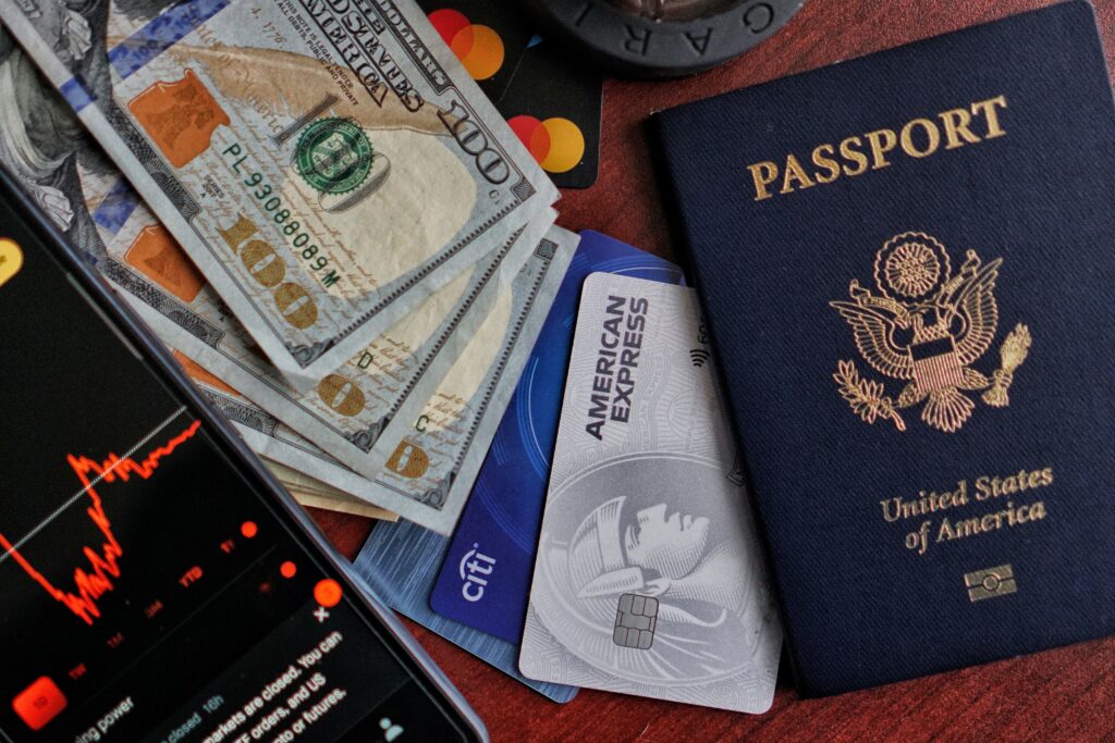 Traveler preparing foreign currency, passport and payment cards before visiting Bali