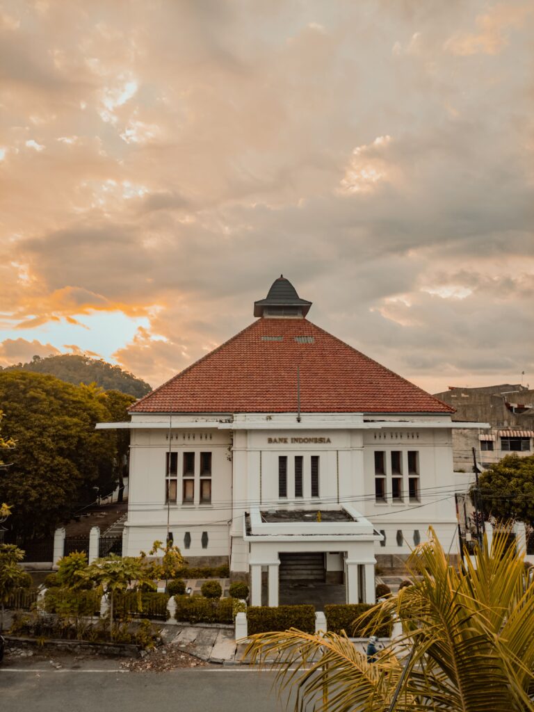 Historic Bank Indonesia building at sunset marking Bank Indonesia's 73rd anniversary