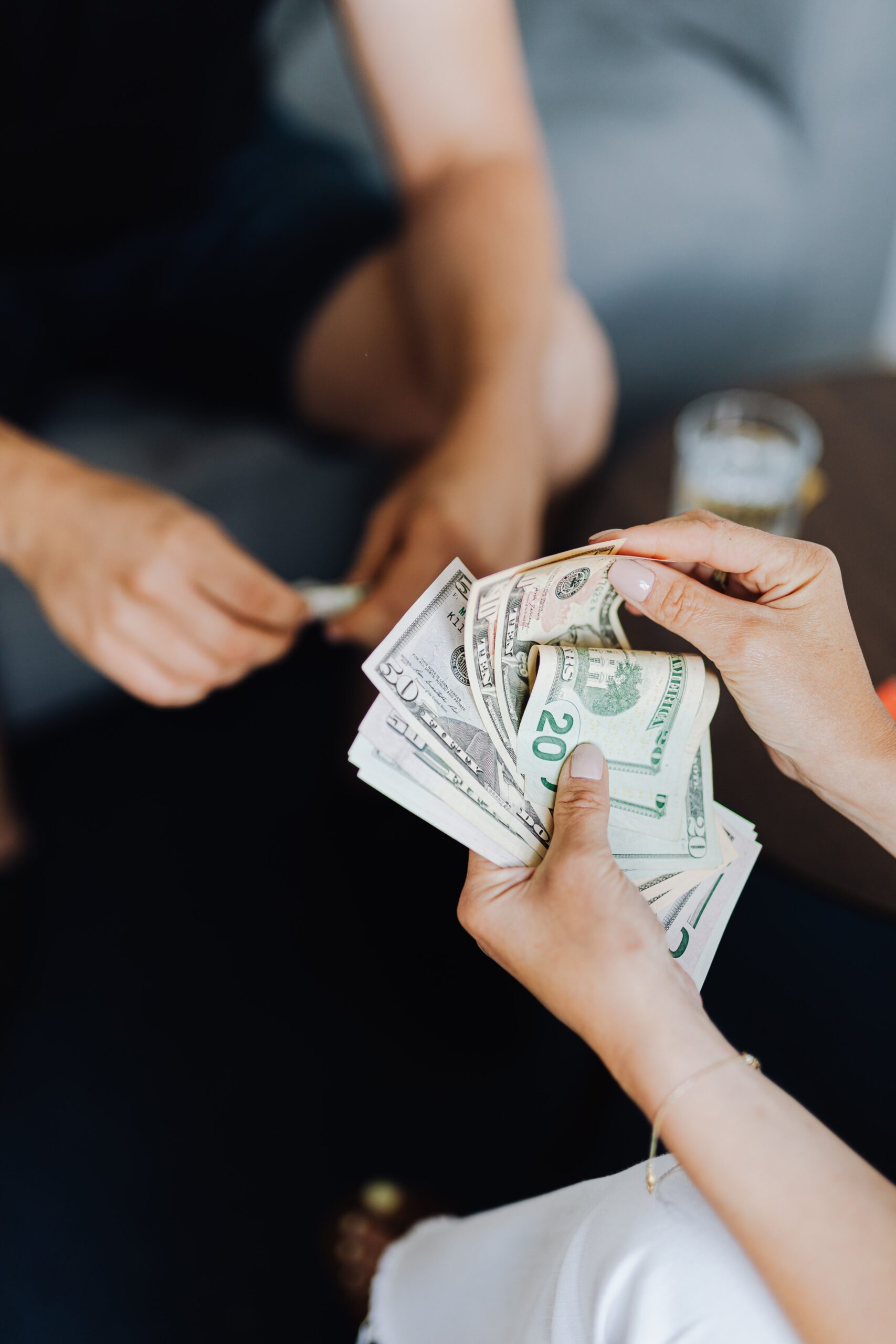 Counting cash carefully to avoid currency exchange scams in Bali