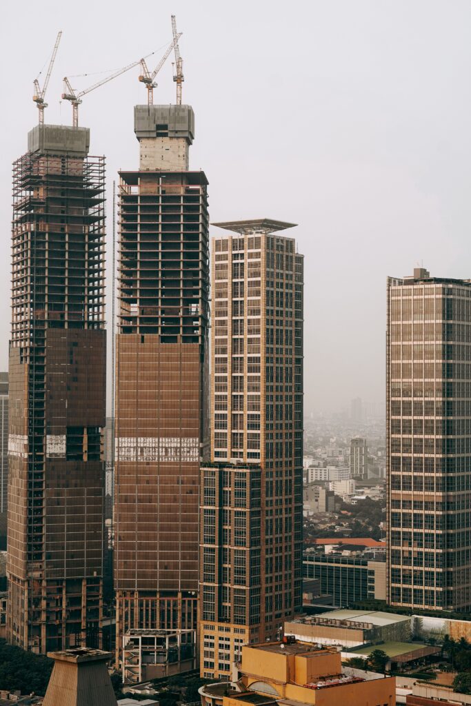 Skyscrapers under construction reflecting Indonesia credit rating momentum toward economic transformation