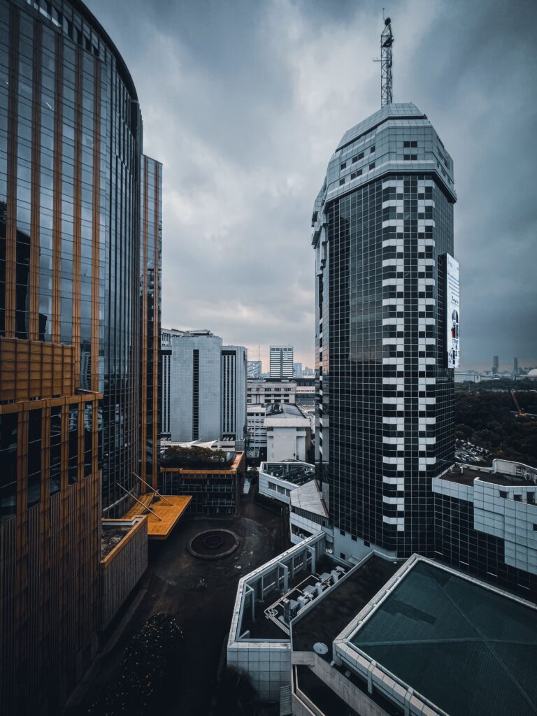 Jakarta skyline under stormy skies as Moody's warns Indonesia fiscal risk remains elevated
