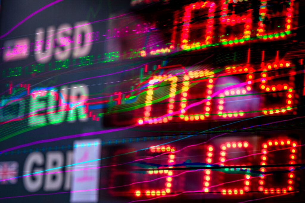 Digital foreign exchange board displaying currency exchange rates as the Indonesian rupiah weakens against the US dollar.