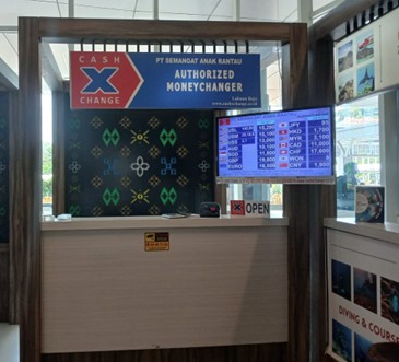 Cash X Change counter at Komodo Airport Labuan Bajo offering authorized foreign currency exchange services