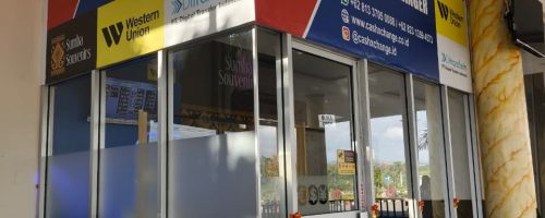 Cash X Change authorized money changer storefront in Tambolaka Airport, Sumba Barat Daya