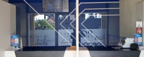 Customer service counter at Cash X Change in Buyuk, Nusa Penida