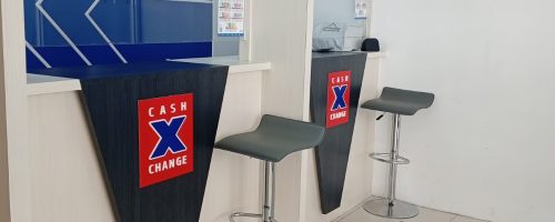 Customer service counter at Cash X Change in Ramayana, Kupang